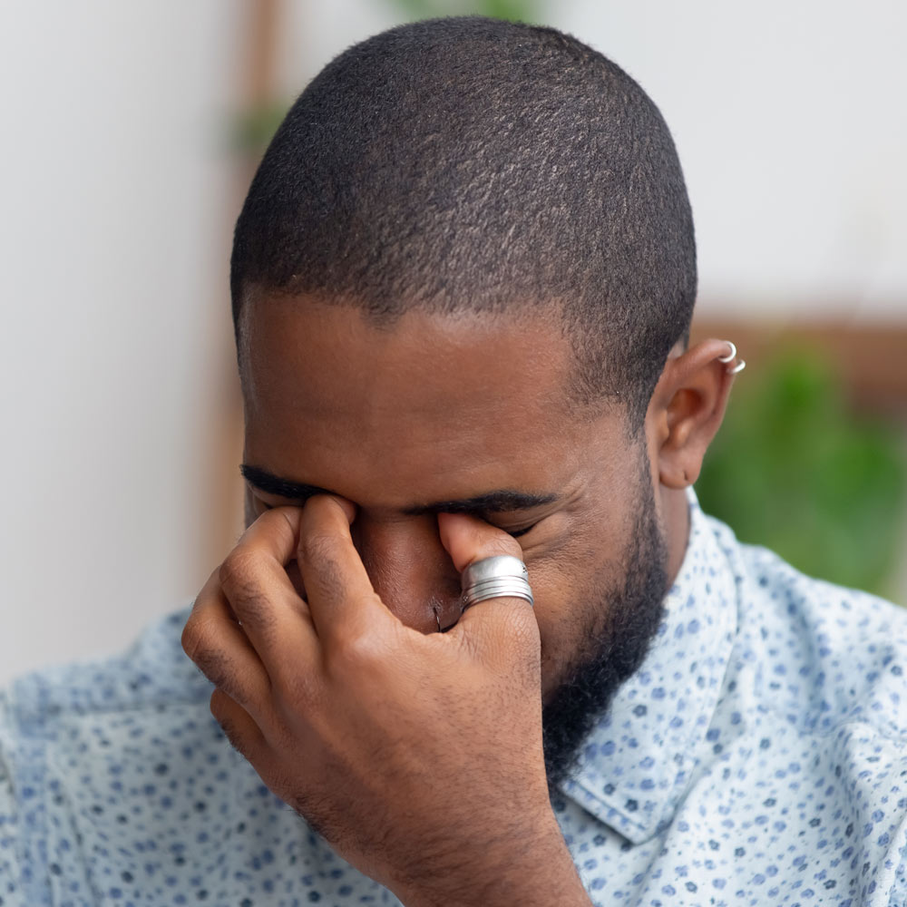 Man with blurred vision