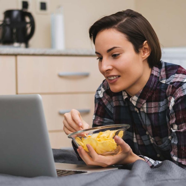 Woman eating chips