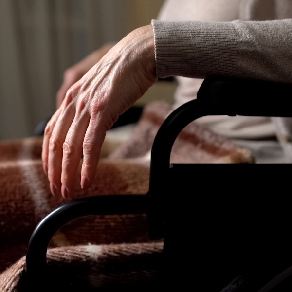 Elderly man in wheelchair