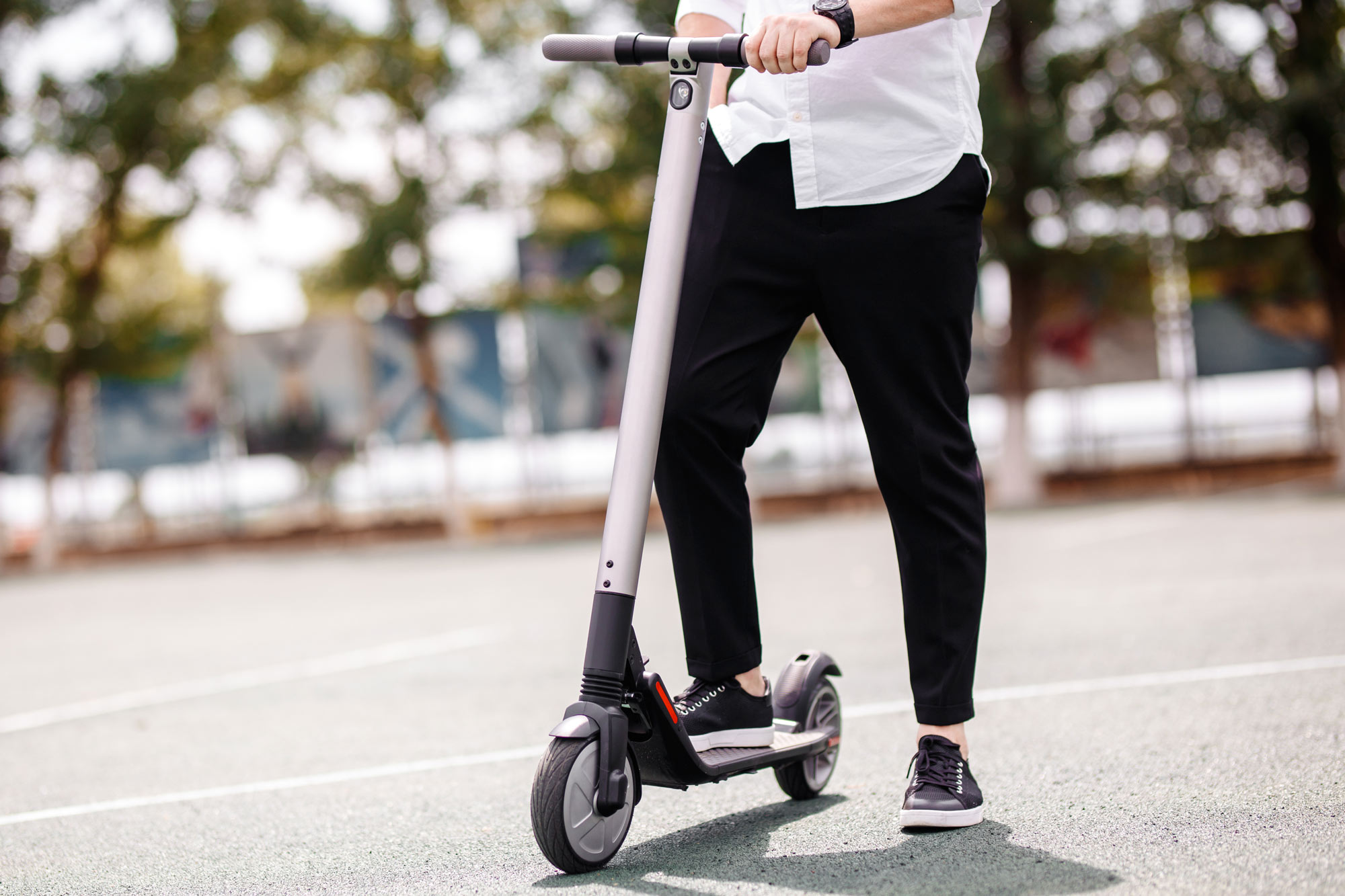 Man on electric scooter