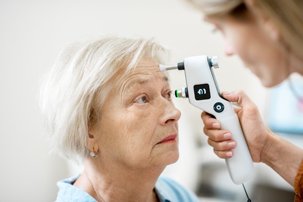 Woman receiving eye pressure test