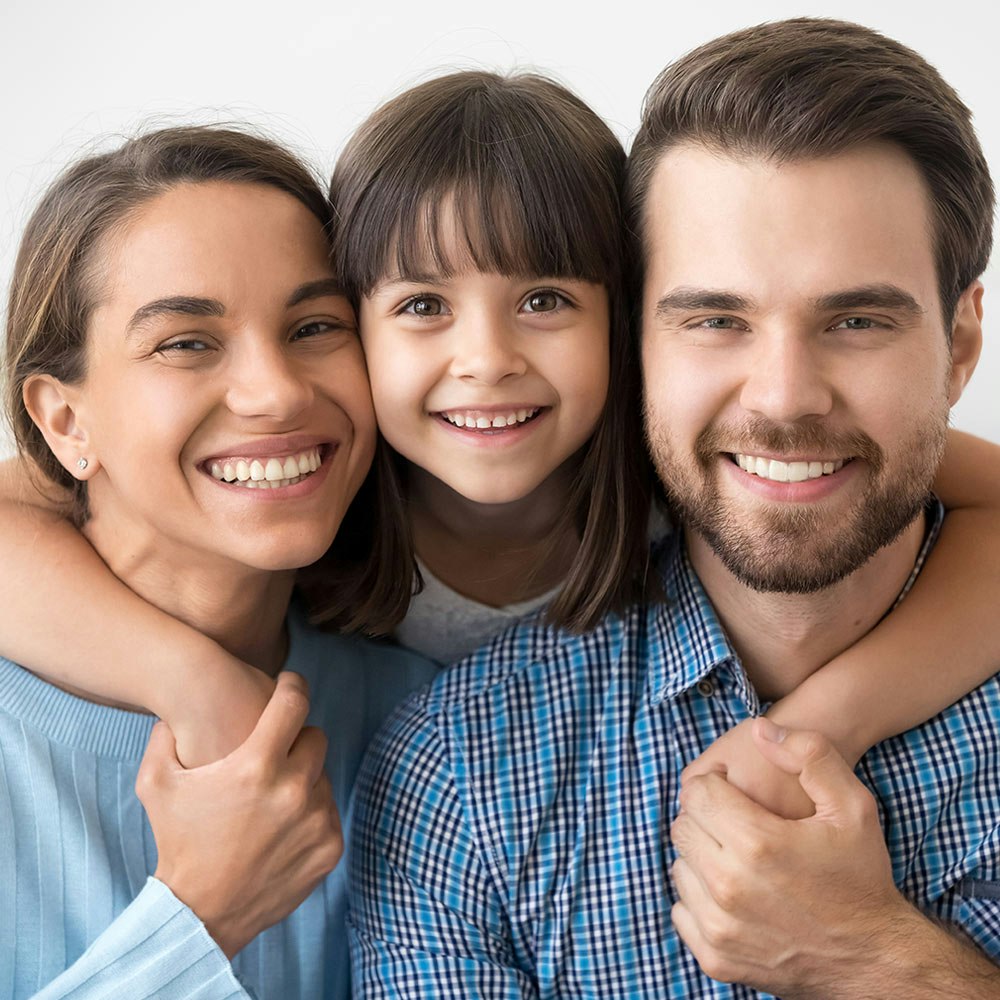 Young family smiling