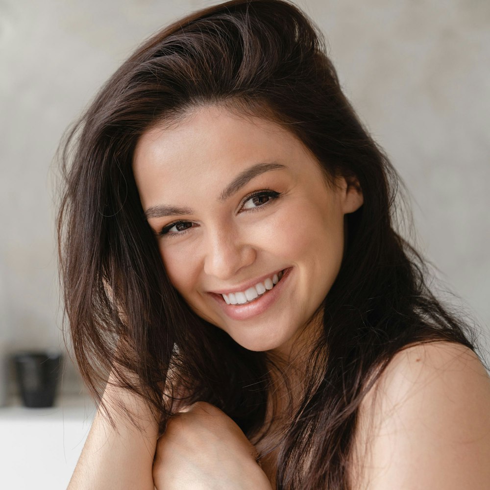 Smiling woman with luscious hair