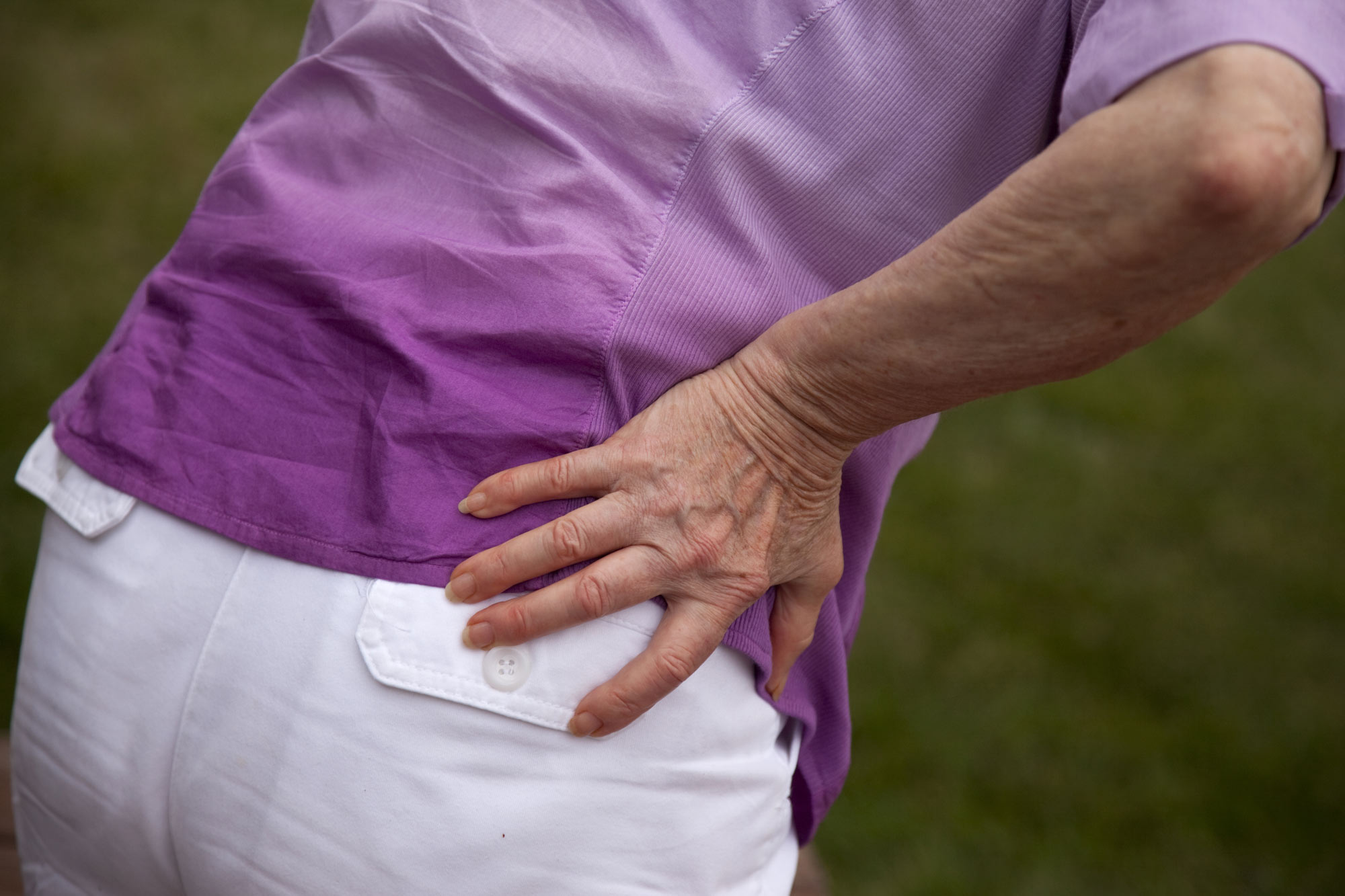 Elderly person experiencing pain from a bad hip