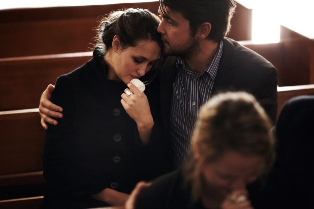 Couple consoling each other