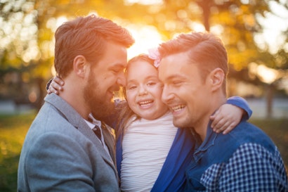 Gay men with their child