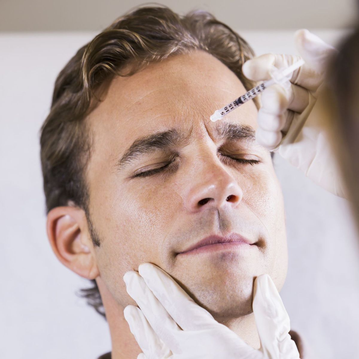 Man receiving injectable