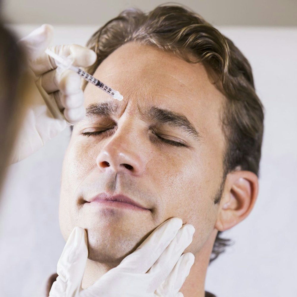 Man receiving injectable