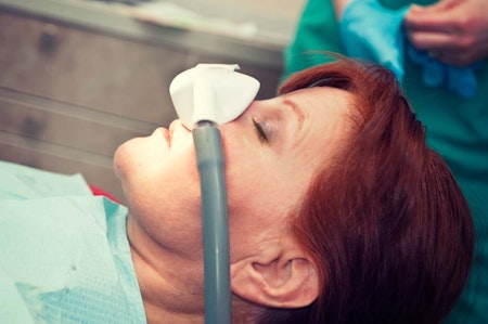 Woman with nasal mask