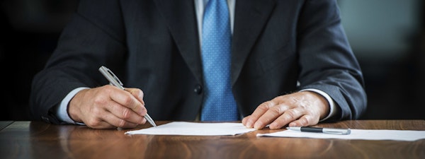 Lawyer writing document