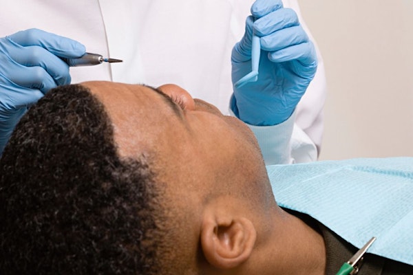 Back view of dental patient under sedation