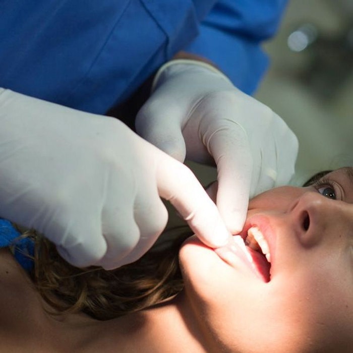 Woman undergoing dental exam