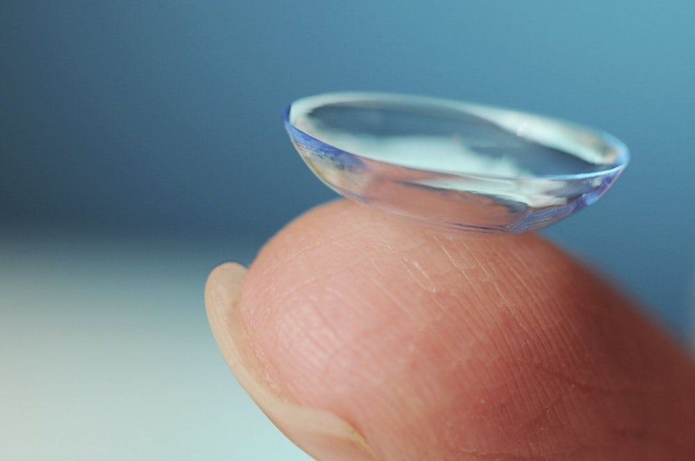 contact lens resting on a finger