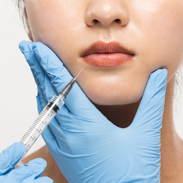 Woman receiving injection