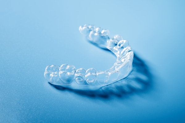 Invisalign on blue background