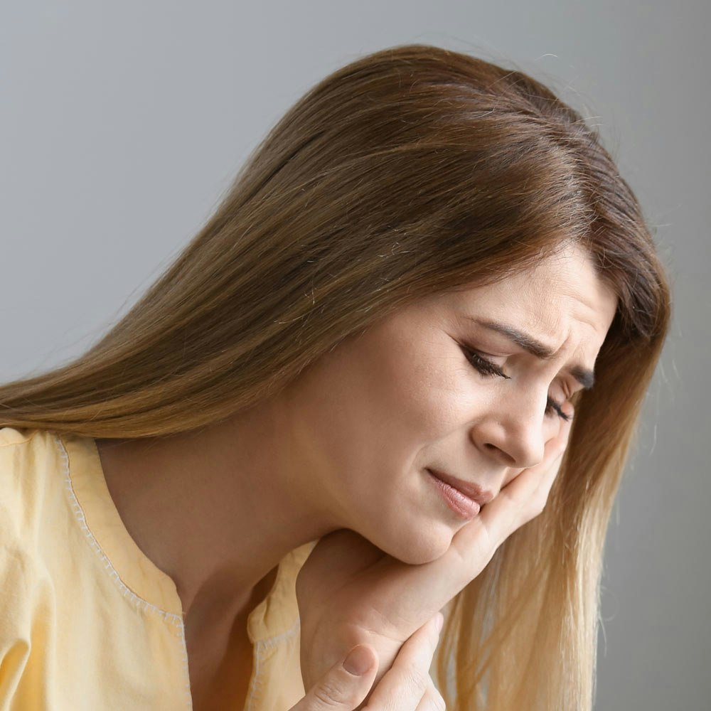 Woman with a toothache