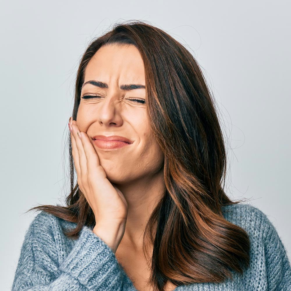 Woman with TMJ pain