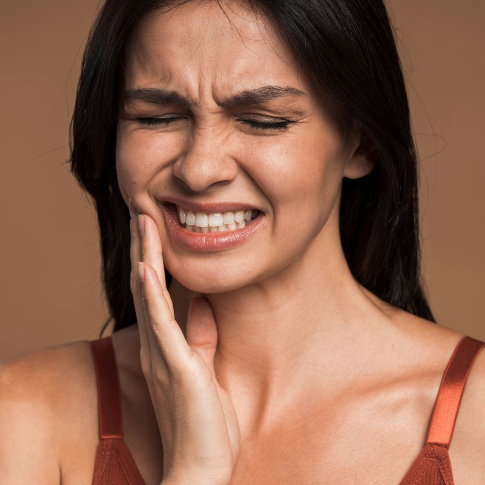 woman with jaw pain
