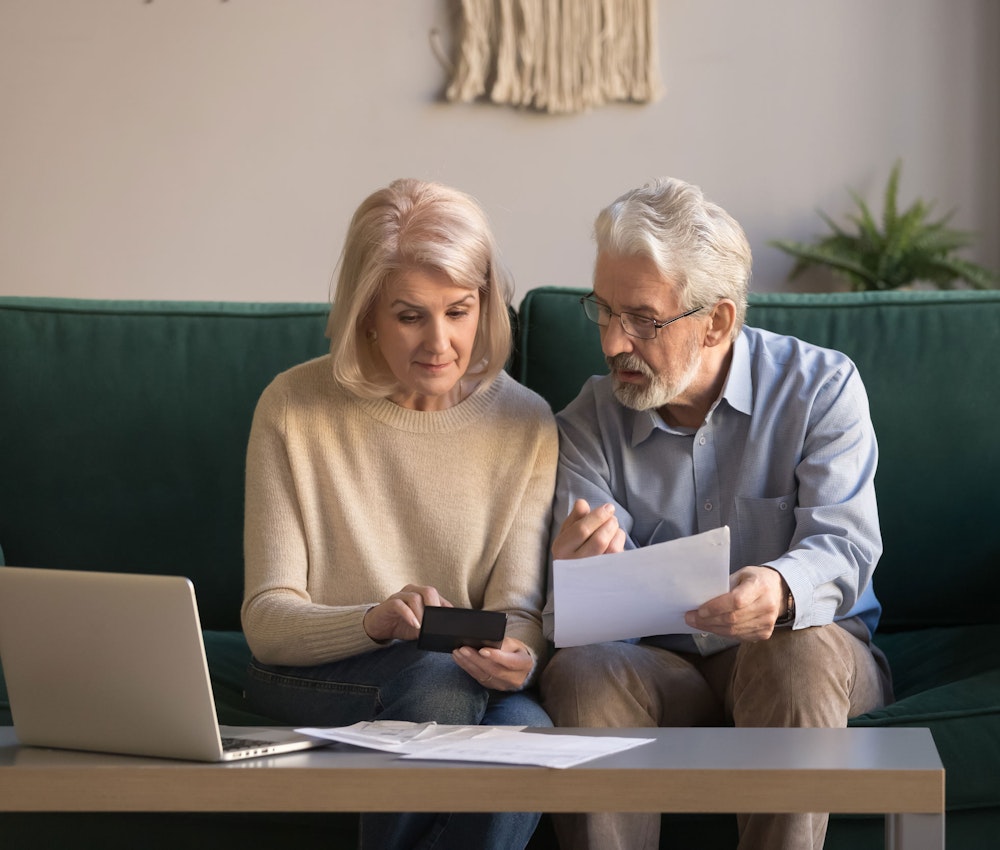Couple going through budgeting
