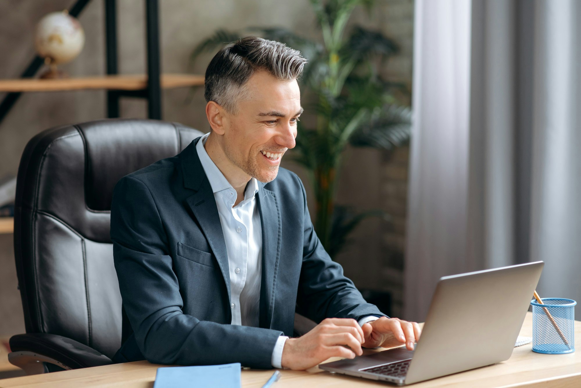 Mature man on his laptop