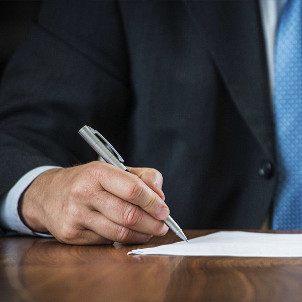 Lawyer pointing to a contract