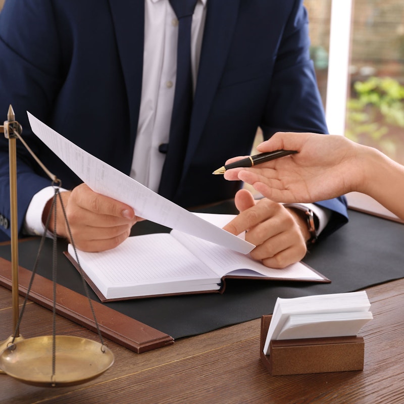 Lawyer talking to client