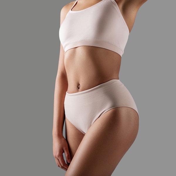 Woman's body wearing pink underwear