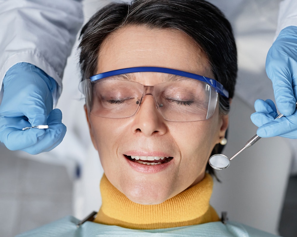 relaxed woman in a dental chair