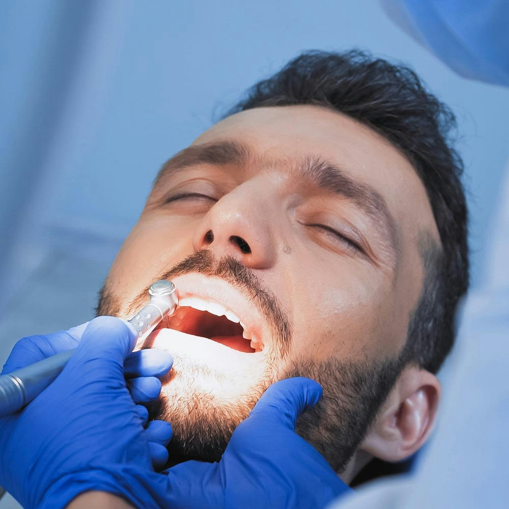 Man receiving dental surgery