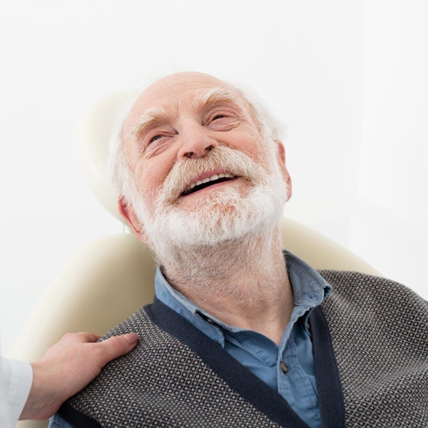 Smiling older dental patient