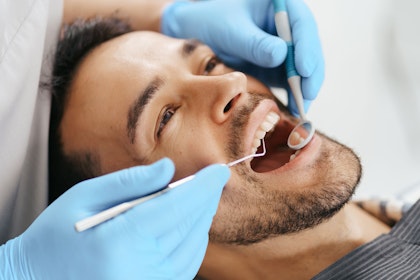 man during dental exam