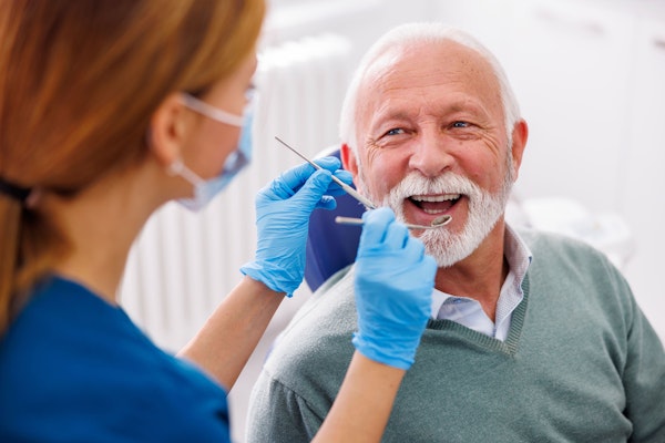 senior man in dentist's chair
