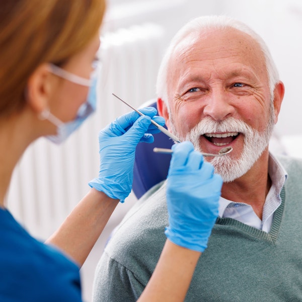 senior man in dentist's chair