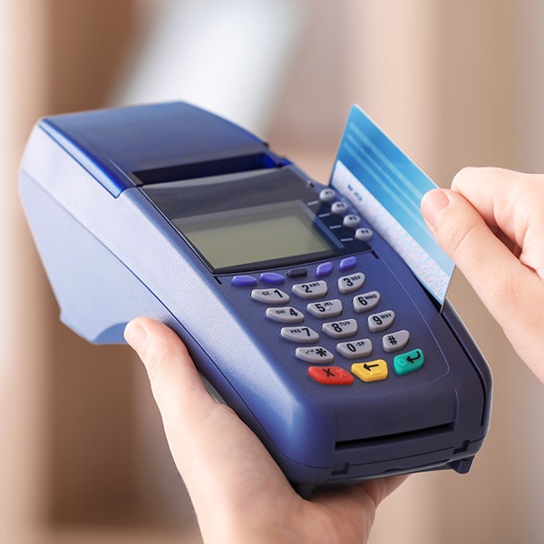 Person paying with credit card