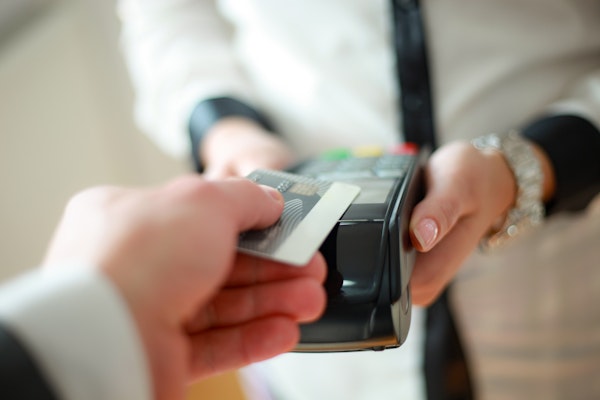 Person paying with card