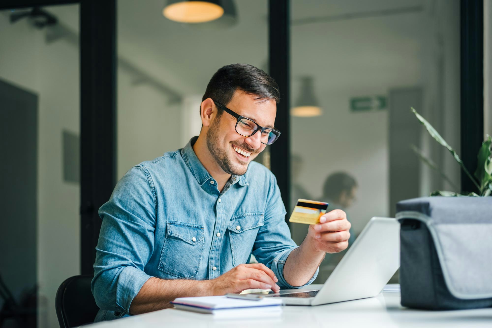 Man paying for dental care