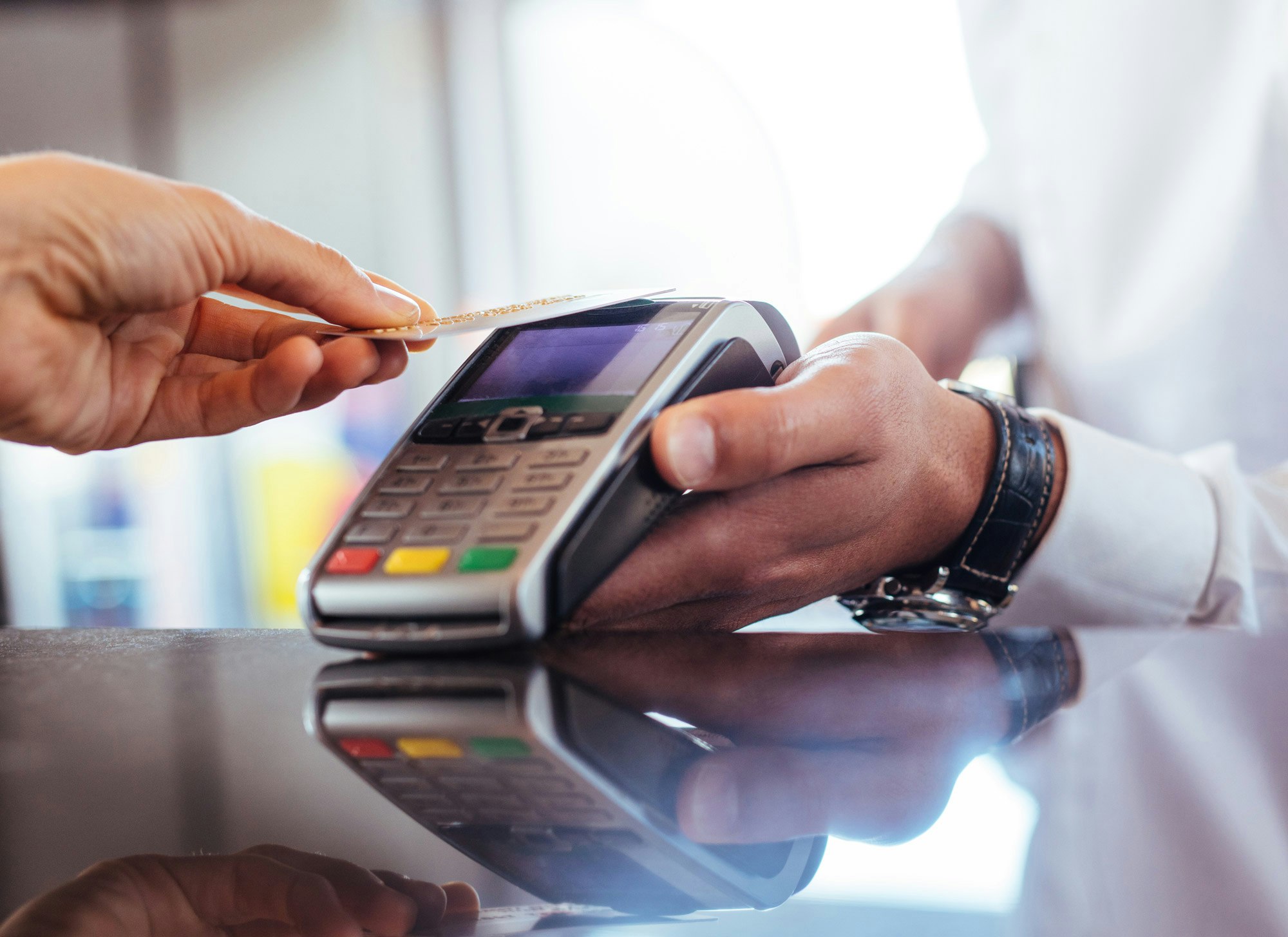 Person paying with credit card