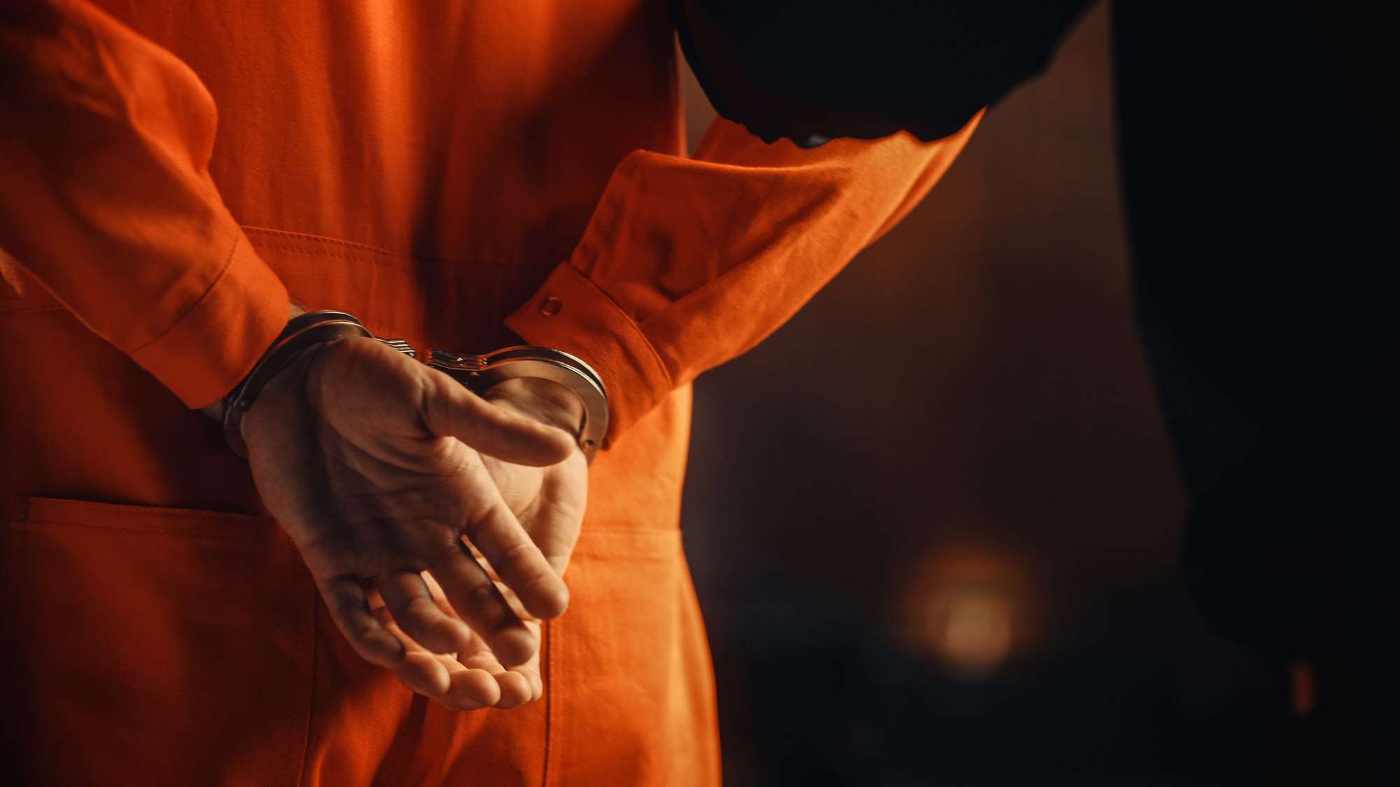 hand cuffed prisoner
