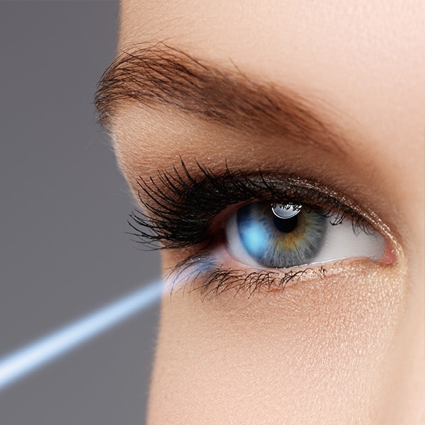 Woman with laser in eye