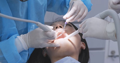 Person receiving dental treatment