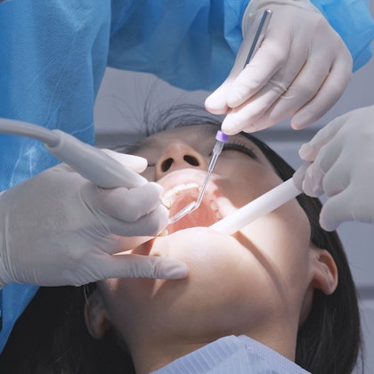 Person receiving dental treatment