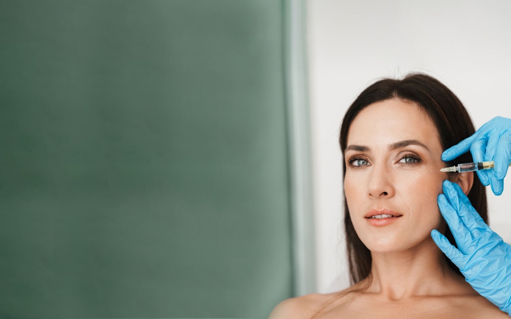 woman receiving facial injections