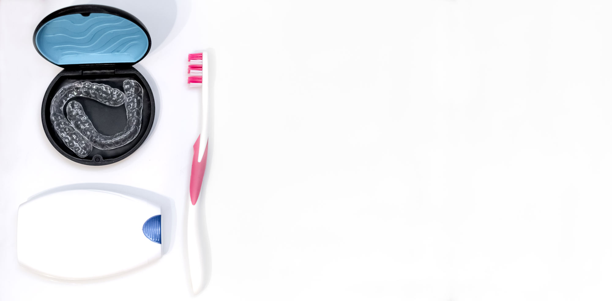 Overview of invisalign, floss, and toothbrush