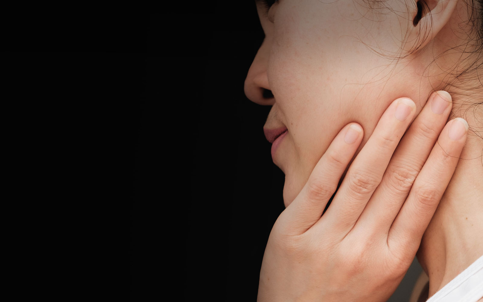 woman with a sore jaw