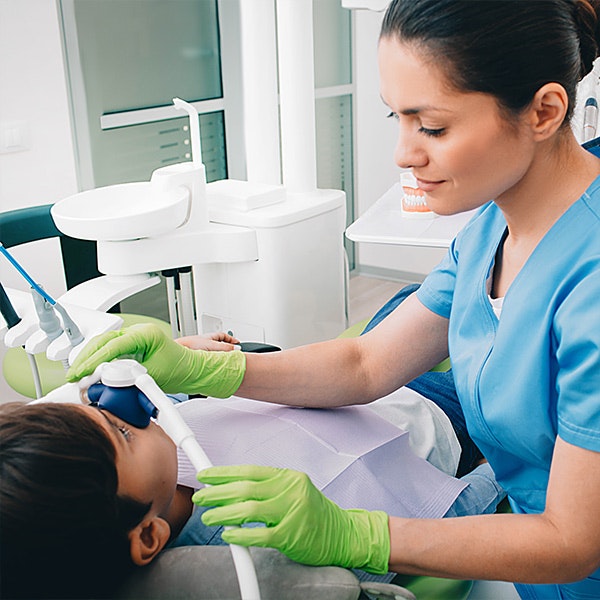 Pediatric dentistry patient receiving nitrous oxide