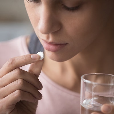 Patient taking oral sedation pill