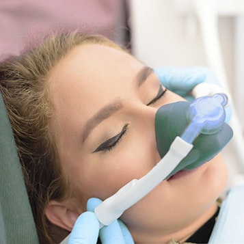 Woman under nitrous oxide sedation
