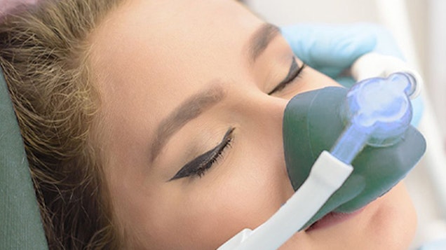Woman under nitrous oxide sedation