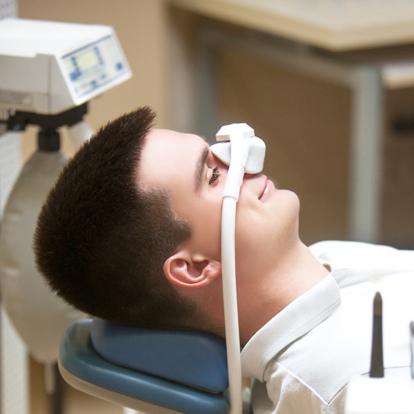 Man in nitrous oxide mask