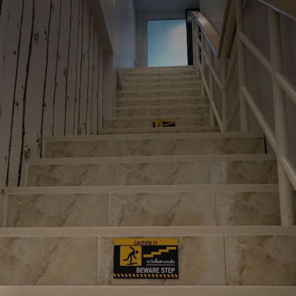 warning sign on stairs